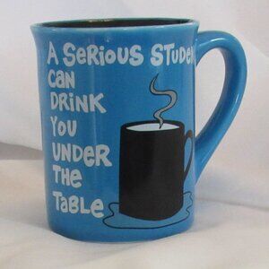 Laurie Veasey Blue Mug Serious Student Drink Under Table Coffee Study All Night